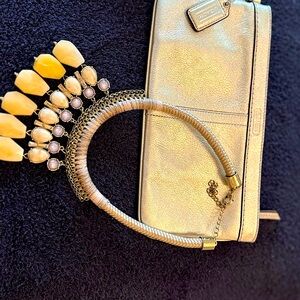 Coach Gold Wristlet with Shell Embellished Necklace accessory